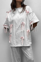 Süßes, einfarbiges T-Shirt mit Rundhalsausschnitt und Schleife